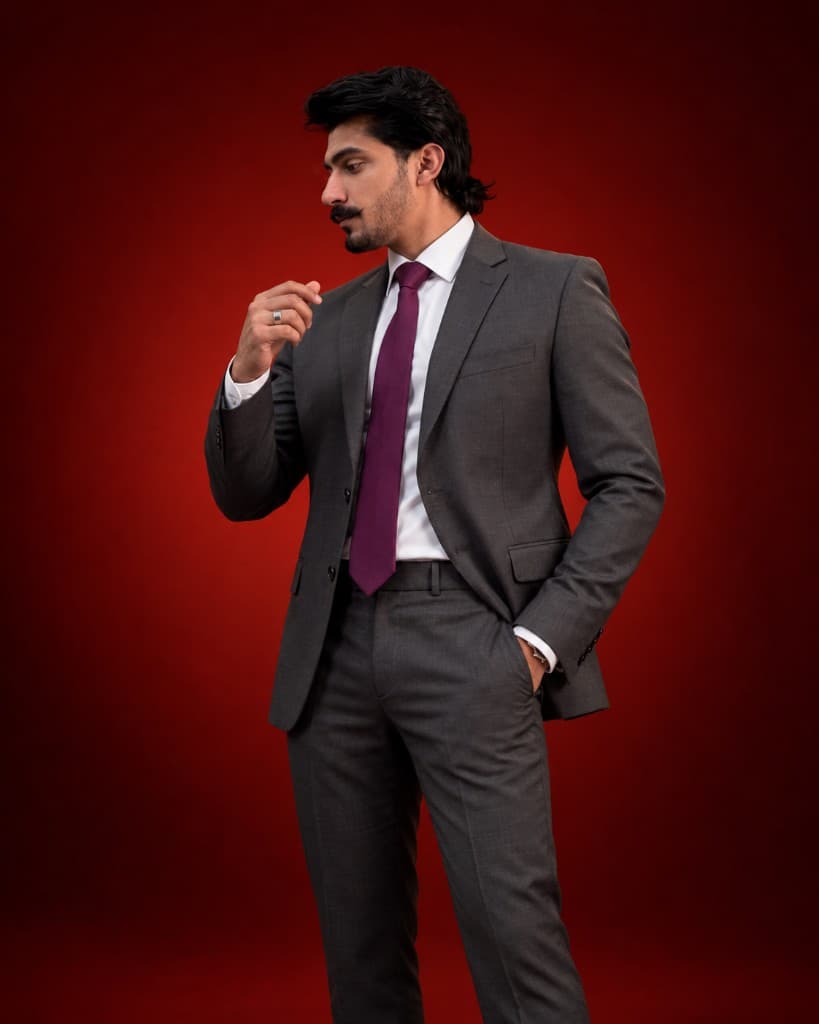 MUSAFIR charcoal suit with plum tie
